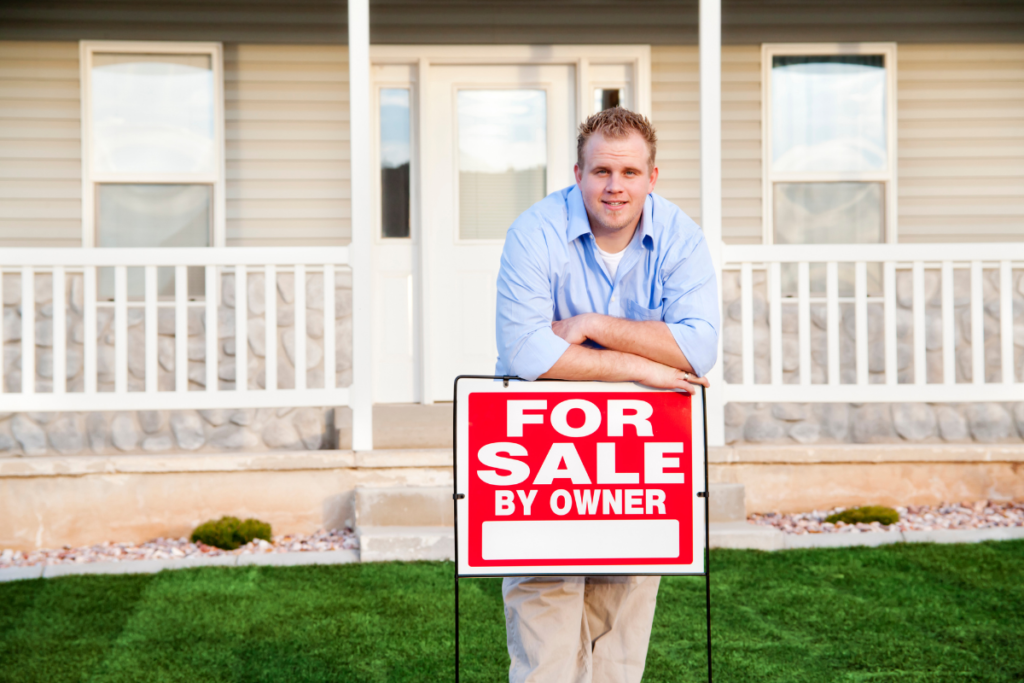 Man With For Sale By Owner Sign